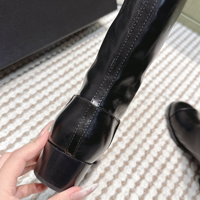 CHANEL 25S HIGH-CALF COWBOY BOOTS IN BLACK CALFSKIN DIAMOND-QUILTED