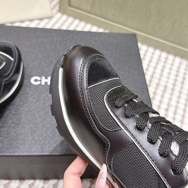 CHANEL 25S SNEAKERS IN BLACK SYNTHETIC FABRIC AND SUEDE CALFSKIN