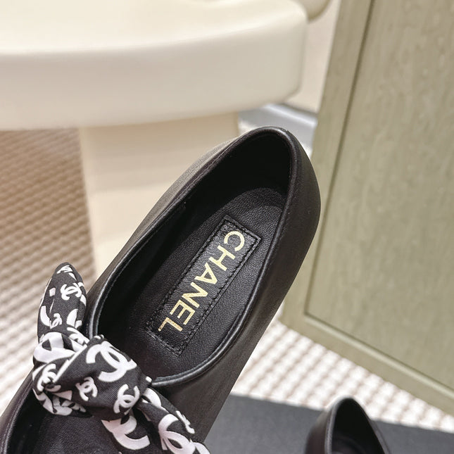 CHANEL 25S MARY JANES IN BLACK SHEARLING AND GROS GRAIN
