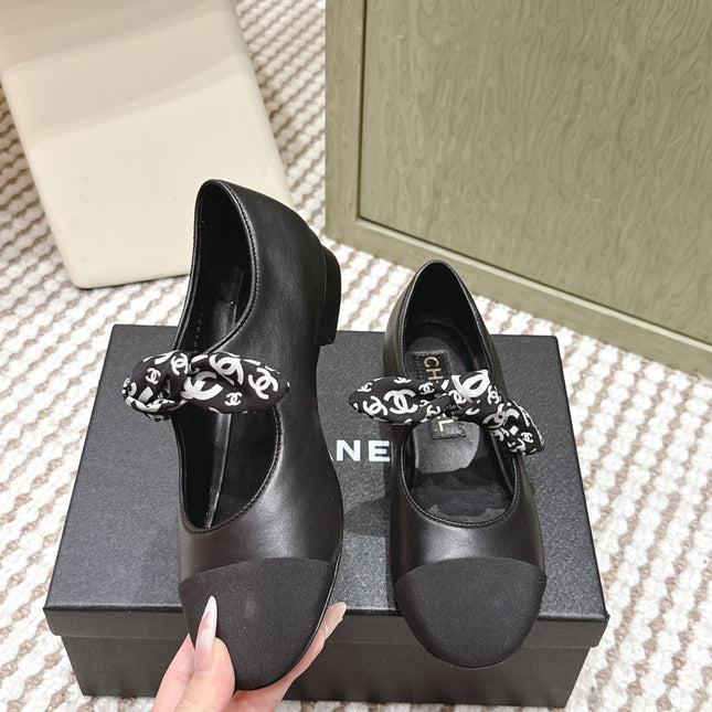 CHANEL 25S MARY JANES IN BLACK SHEARLING AND GROS GRAIN