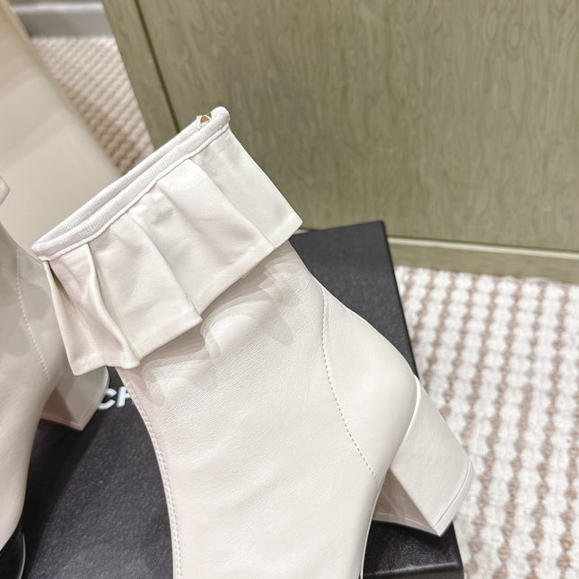 CHANEL 25S ANKLE BOOTS IN  WHITE CALFSKIN AND BLACK GLOSSY TOE RUCHED