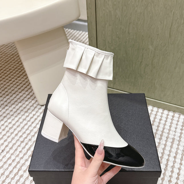 CHANEL 25S ANKLE BOOTS IN  WHITE CALFSKIN AND BLACK GLOSSY TOE RUCHED