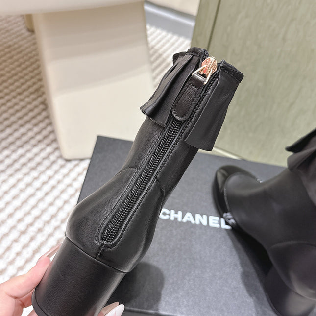 CHANEL 25S ANKLE BOOTS IN BLACK CALFSKIN GLOSSY TOE RUCHED