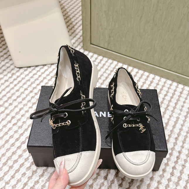 CHANEL 25S MOCCASINS IN BLACK AND LIGHT GREY SUEDE