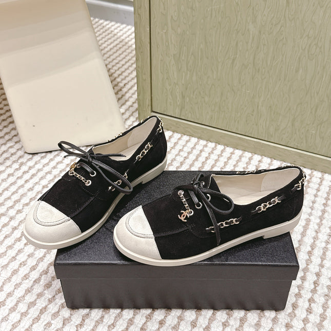 CHANEL 25S MOCCASINS IN BLACK AND LIGHT GREY SUEDE