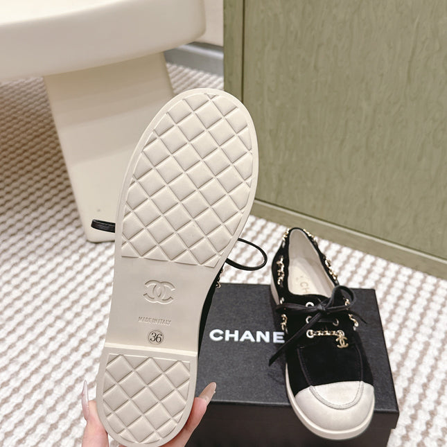 CHANEL 25S MOCCASINS IN BLACK AND LIGHT GREY SUEDE