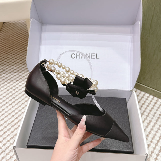 CHANEL 25S ESPADRILLE FLATS IN BLACK CALFSKIN WITH PEARL STRAP