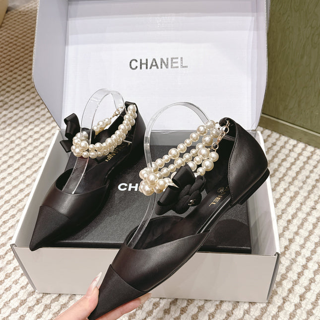 CHANEL 25S ESPADRILLE FLATS IN BLACK CALFSKIN WITH PEARL STRAP