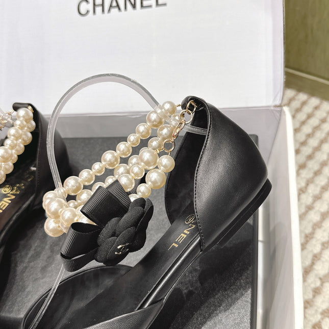 CHANEL 25S ESPADRILLE FLATS IN BLACK CALFSKIN WITH PEARL STRAP