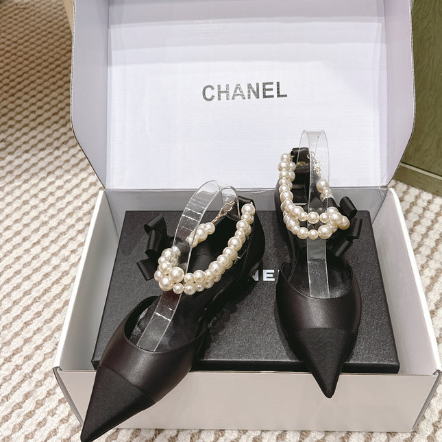 CHANEL 25S ESPADRILLE FLATS IN BLACK CALFSKIN WITH PEARL STRAP