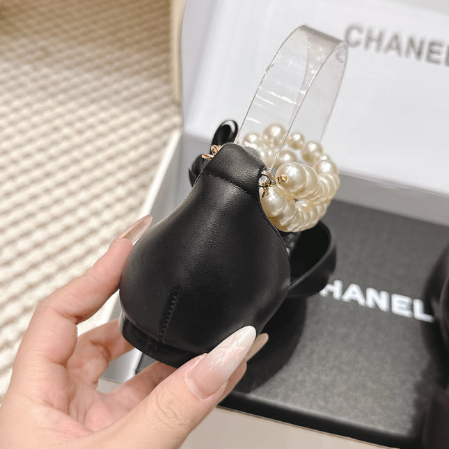 CHANEL 25S ESPADRILLE FLATS IN BLACK CALFSKIN WITH PEARL STRAP