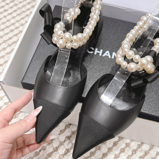CHANEL 25S ESPADRILLE FLATS IN BLACK CALFSKIN WITH PEARL STRAP