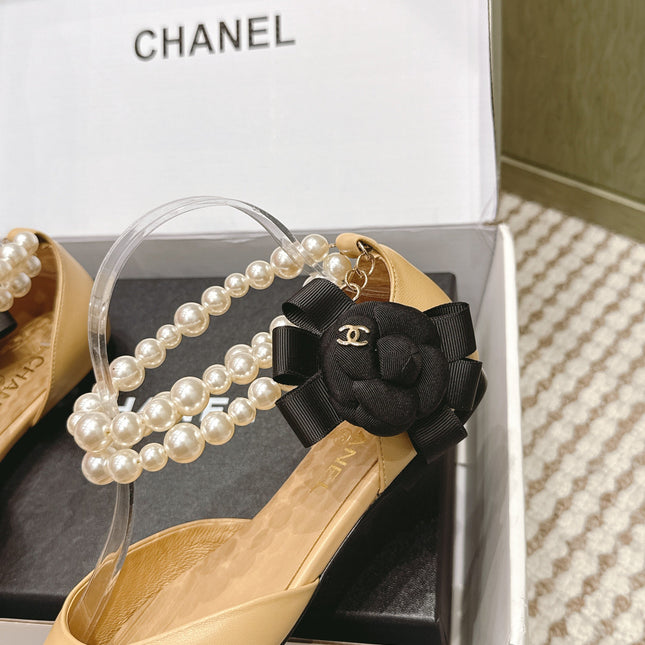CHANEL 25S ESPADRILLE FLATS IN BEIGE AND BLACK CALFSKIN WITH PEARL STRAP