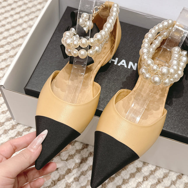 CHANEL 25S ESPADRILLE FLATS IN BEIGE AND BLACK CALFSKIN WITH PEARL STRAP
