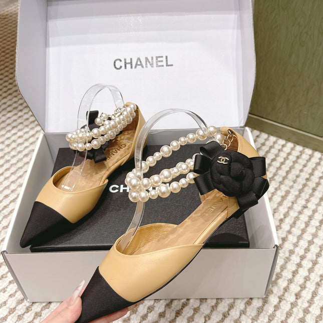 CHANEL 25S ESPADRILLE FLATS IN BEIGE AND BLACK CALFSKIN WITH PEARL STRAP