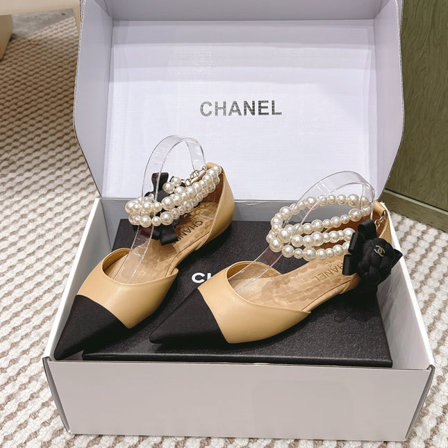 CHANEL 25S ESPADRILLE FLATS IN BEIGE AND BLACK CALFSKIN WITH PEARL STRAP