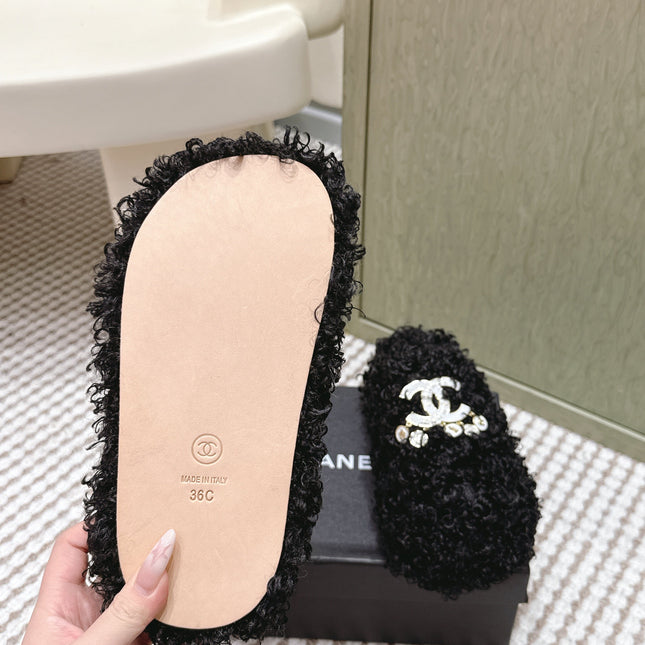 CHANEL 25S CLASSIC FURRY SLIDES IN BLACK WITH DOUBLE C LOGO