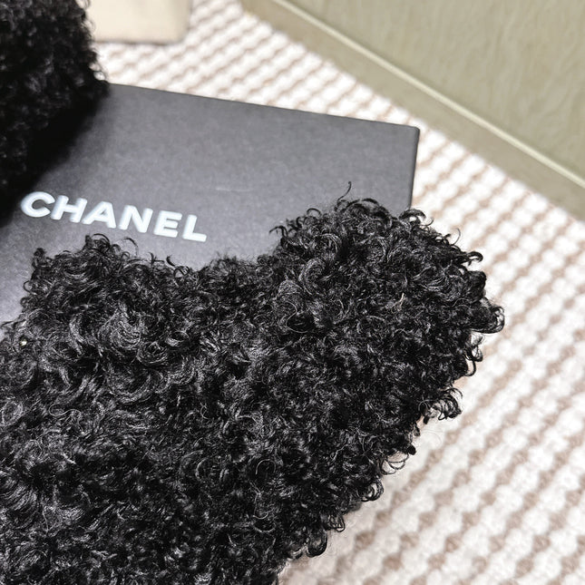 CHANEL 25S CLASSIC FURRY SLIDES IN BLACK WITH DOUBLE C LOGO