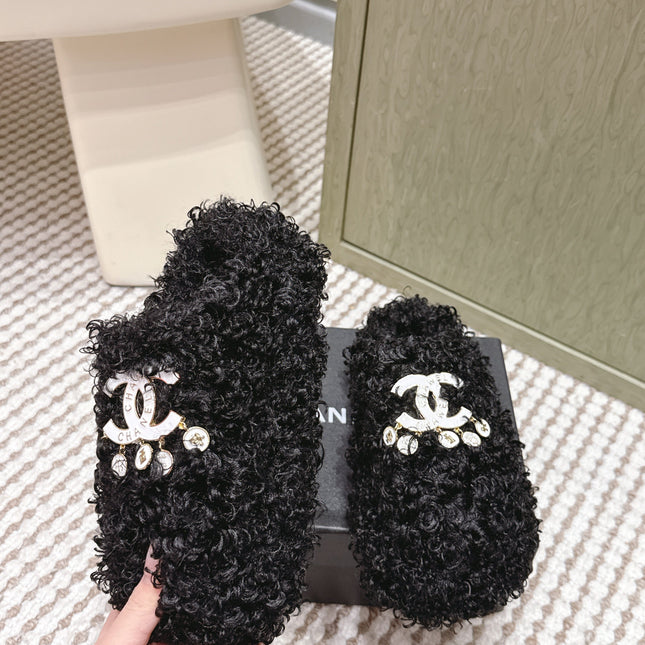 CHANEL 25S CLASSIC FURRY SLIDES IN BLACK WITH DOUBLE C LOGO