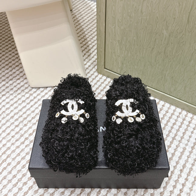 CHANEL 25S CLASSIC FURRY SLIDES IN BLACK WITH DOUBLE C LOGO