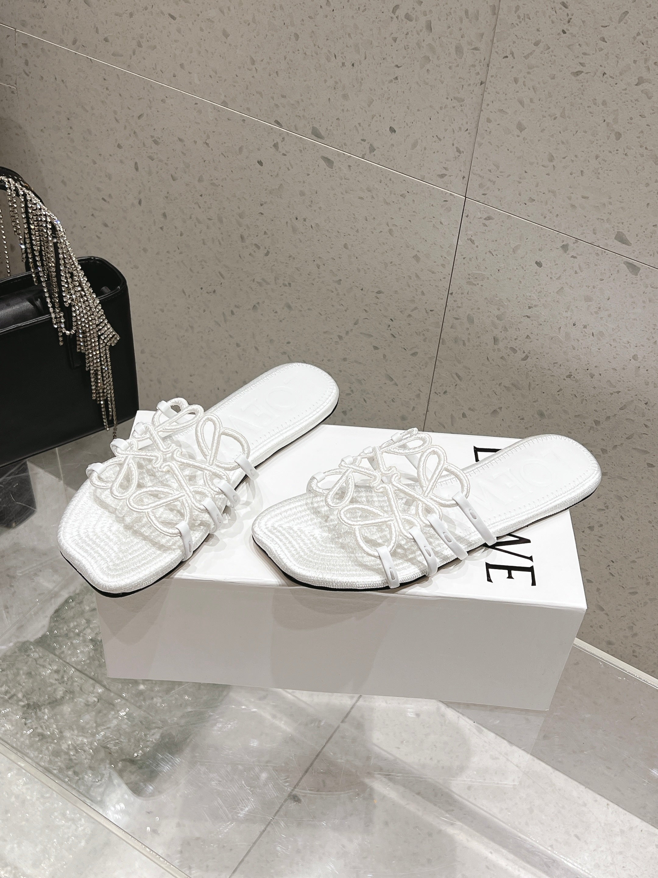LOEWE 26S BRAIDED CAGE SLIDE SANDALS IN WHITE CALFSKIN