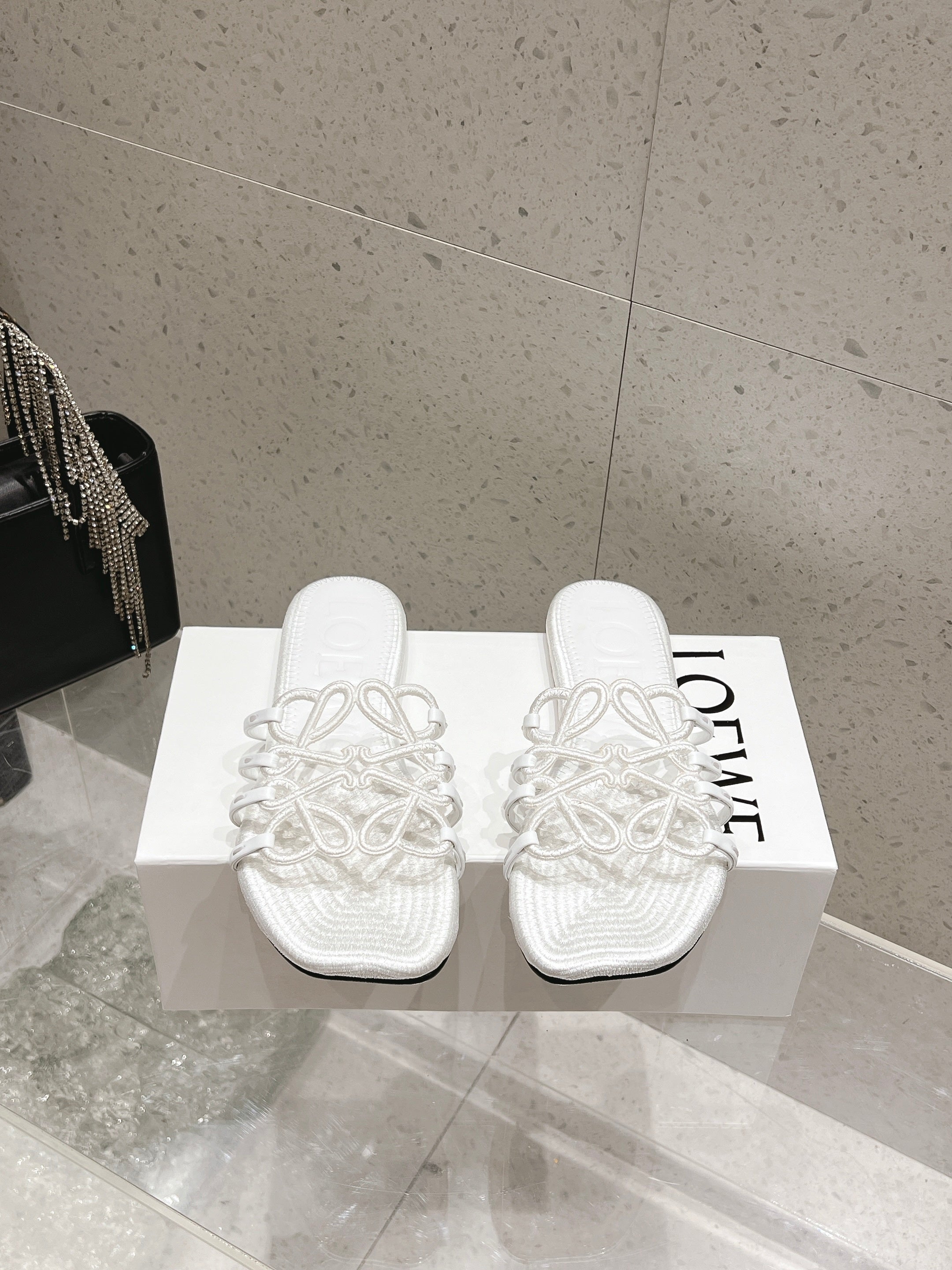 LOEWE 26S BRAIDED CAGE SLIDE SANDALS IN WHITE CALFSKIN