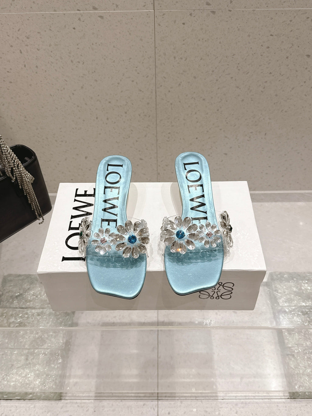 LOEWE 26S MULE HEELS 45MM IN LIGHT BLUE PVC WITH CRYSTAL FLORAL