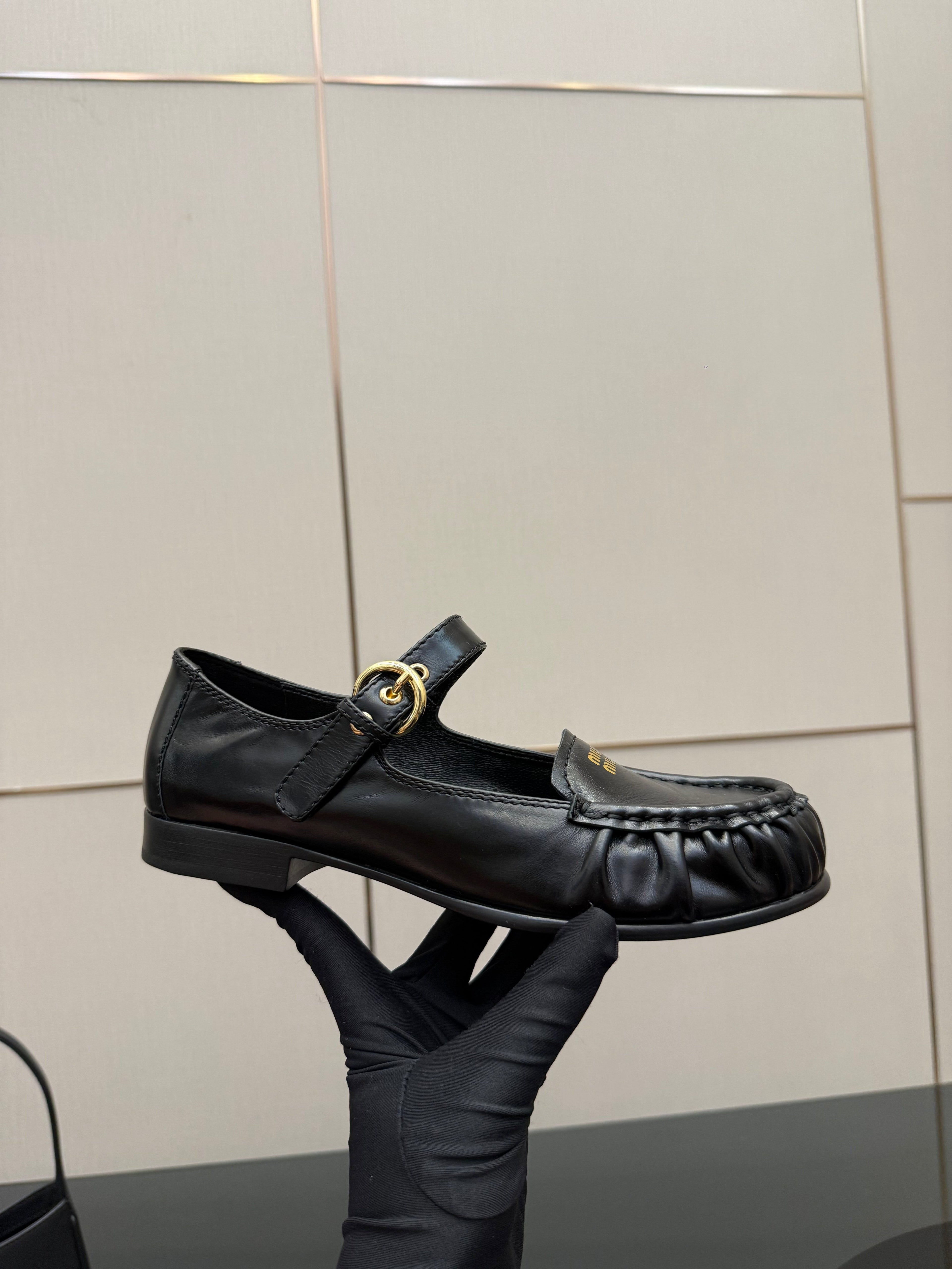 MIUMIU 25S LOAFERS WITH STRAP IN BLACK LAMBSKIN