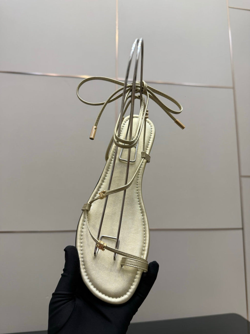CELINE 26S TRIOMPHE LACE UP FLAT SANDALS IN GOLD CALFSKIN