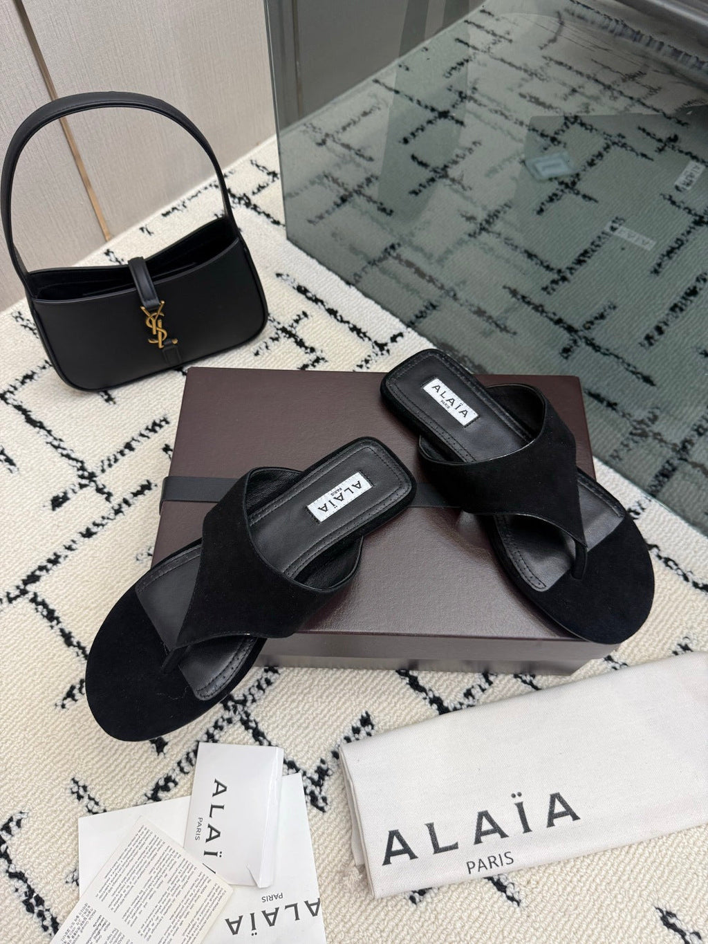 ALAIA 26S THONG MULE SANDALS IN BLACK SUEDE