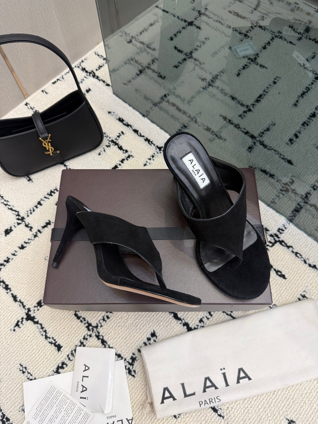 ALAIA 26S HEELED THONG MULE SANDALS IN BLACK SUEDE