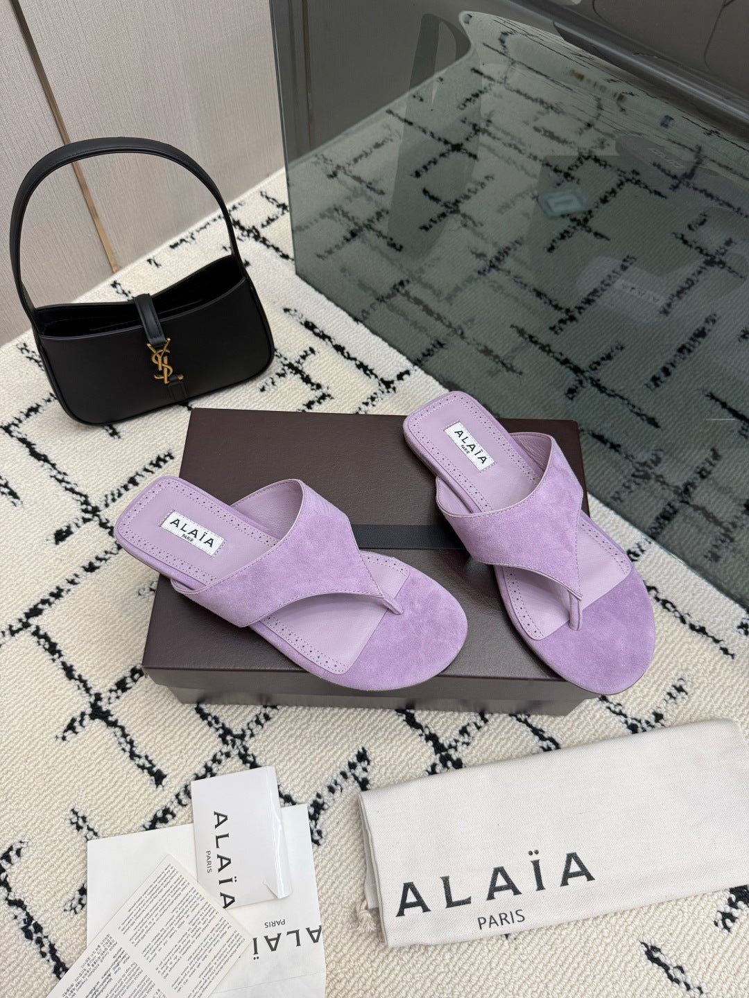 ALAIA 26S THONG MULE SANDALS IN PURPLE SUEDE