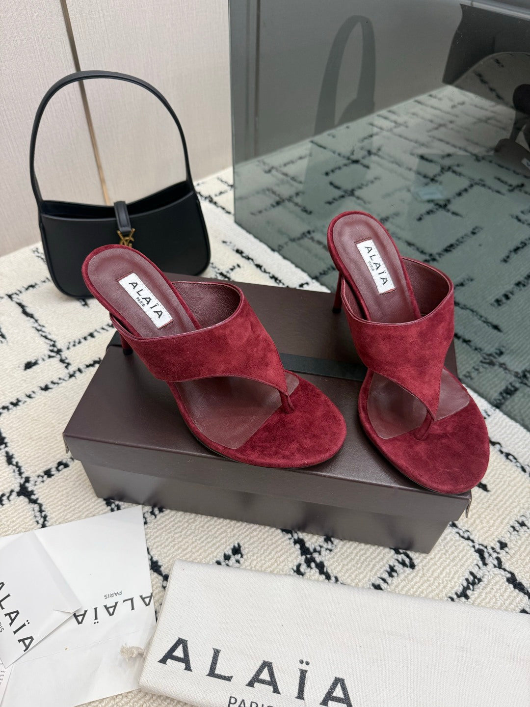 ALAIA 26S HEELED THONG MULE SANDALS IN BURGUNDY SUEDE