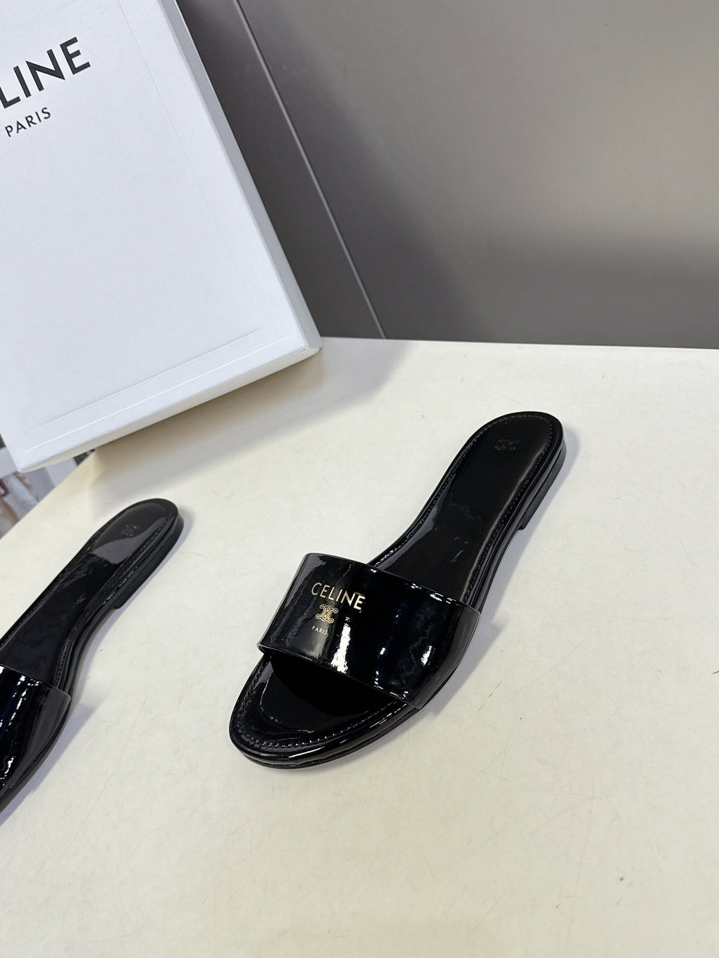 CELINE 26S FLAT SLIDES IN BLACK PATENT LAMBSKIN