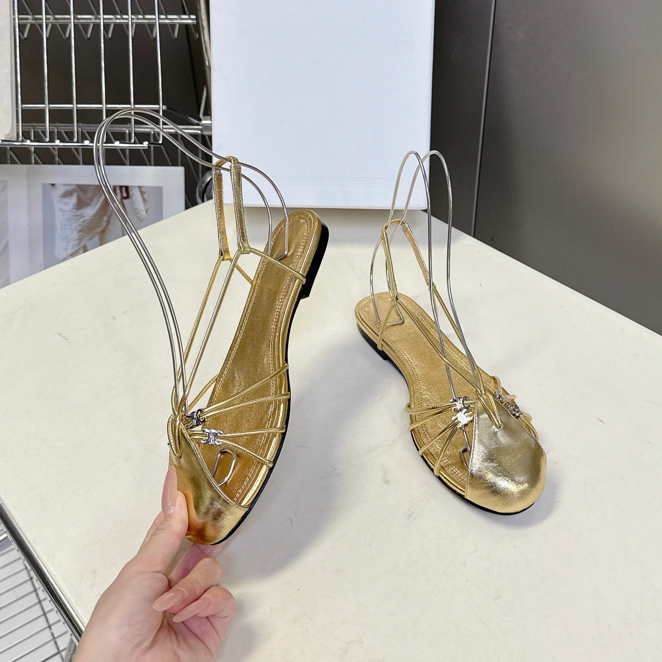 CELINE 26S TRIOMPHE LACE UP ANKLE STRAP FLAT SANDALS IN GOLD CALFSKIN
