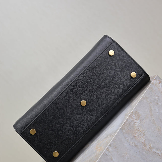 YSL 25S SAC DE JOUR GM 32 IN BLACK SUPPLE GRAINED CALFSKIN GOLD HARDWARE