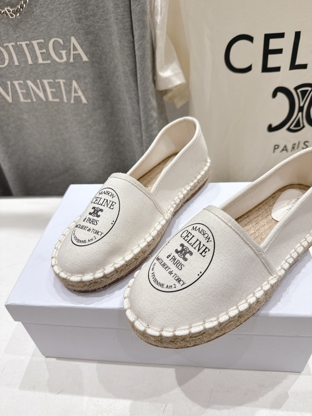 CELINE 26S MAISON PARIS EMBLEM ESPADRILLE FLATS IN IVORY WHITE CANVAS
