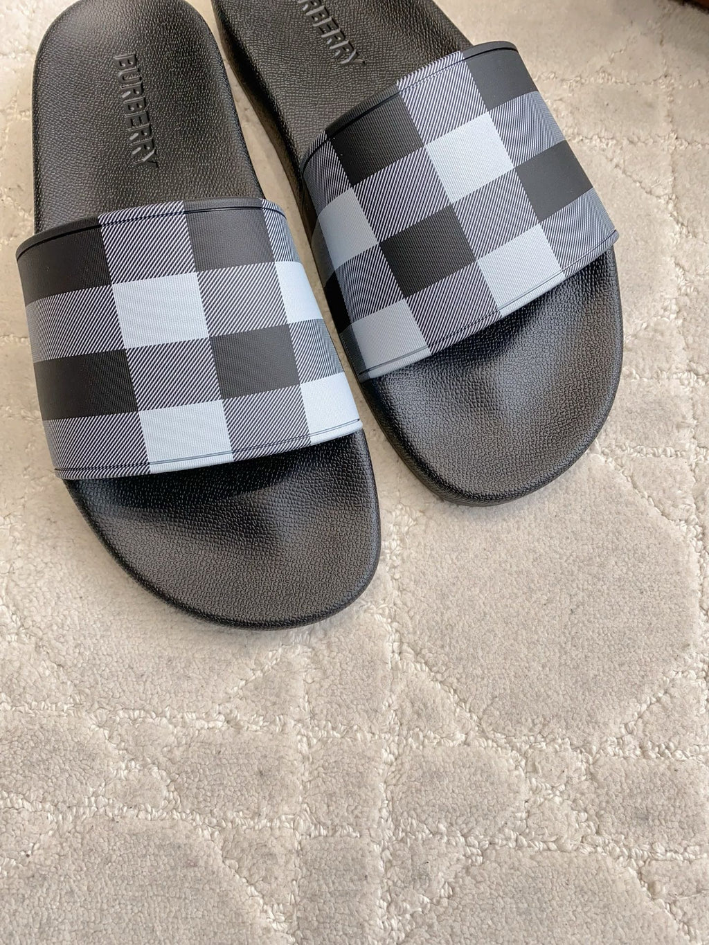 BURBERRY 26S CHECK PRINT RUBBER SLIDES IN BLACK CALFSKIN
