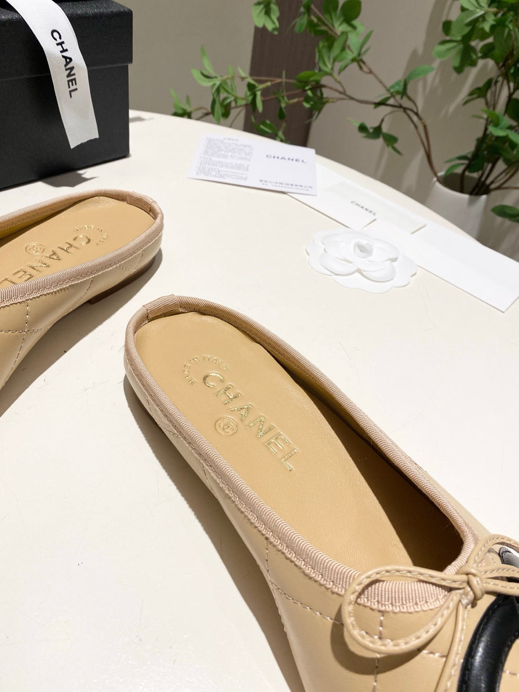 CHANEL 26S FLAT MULES IN BEIGE LAMBSKIN