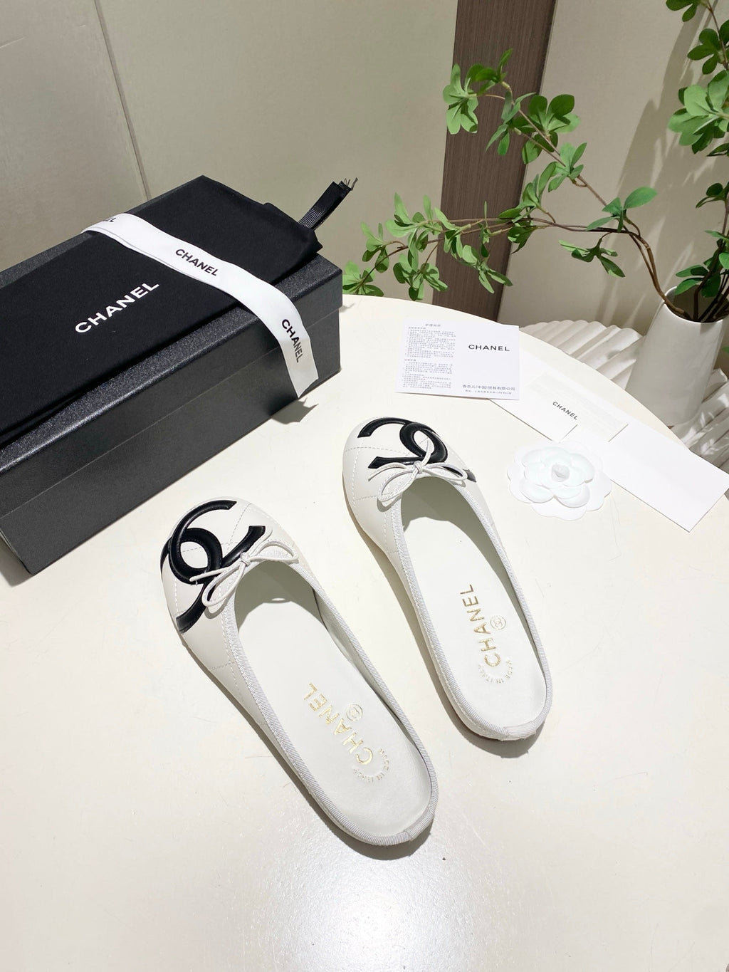 CHANEL 26S FLAT MULES IN WHITE LAMBSKIN