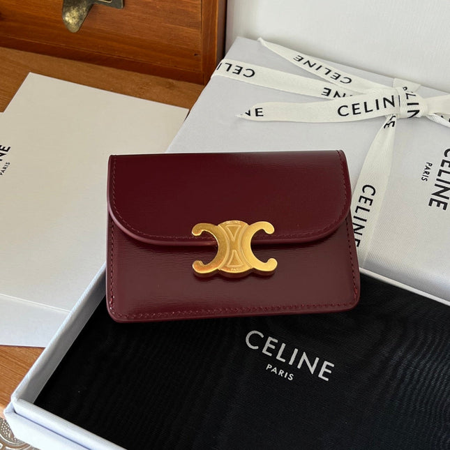 TRIOMPHE WALLET 10 IN BURGUNDY RED CALFSKIN GOLD HARDWARE
