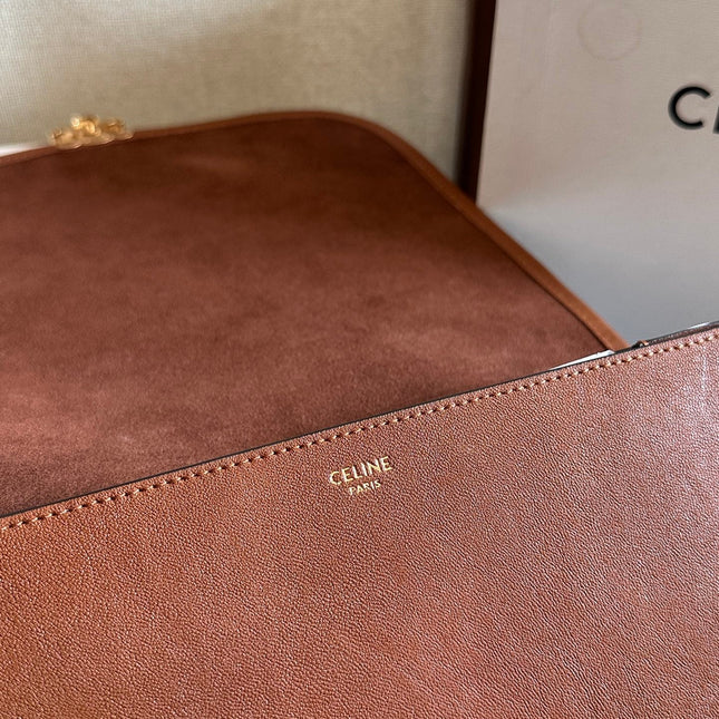 CELINE 25S BESACE SOFT TRIOMPHE 32MM IN BROWN SUPPLE SHINY LAMBSKIN