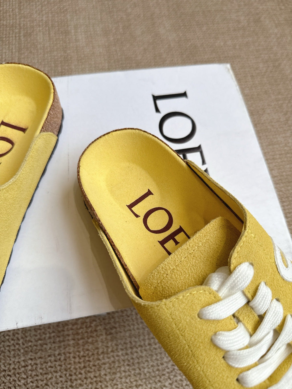 LOEWE 26S LACE-UP FLAT SLIDES IN YELLOW SUEDE