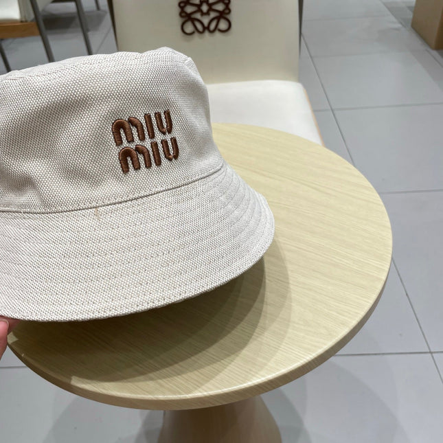 MIUMIU REVERSIBLE BUCKET HAT STYLE 81