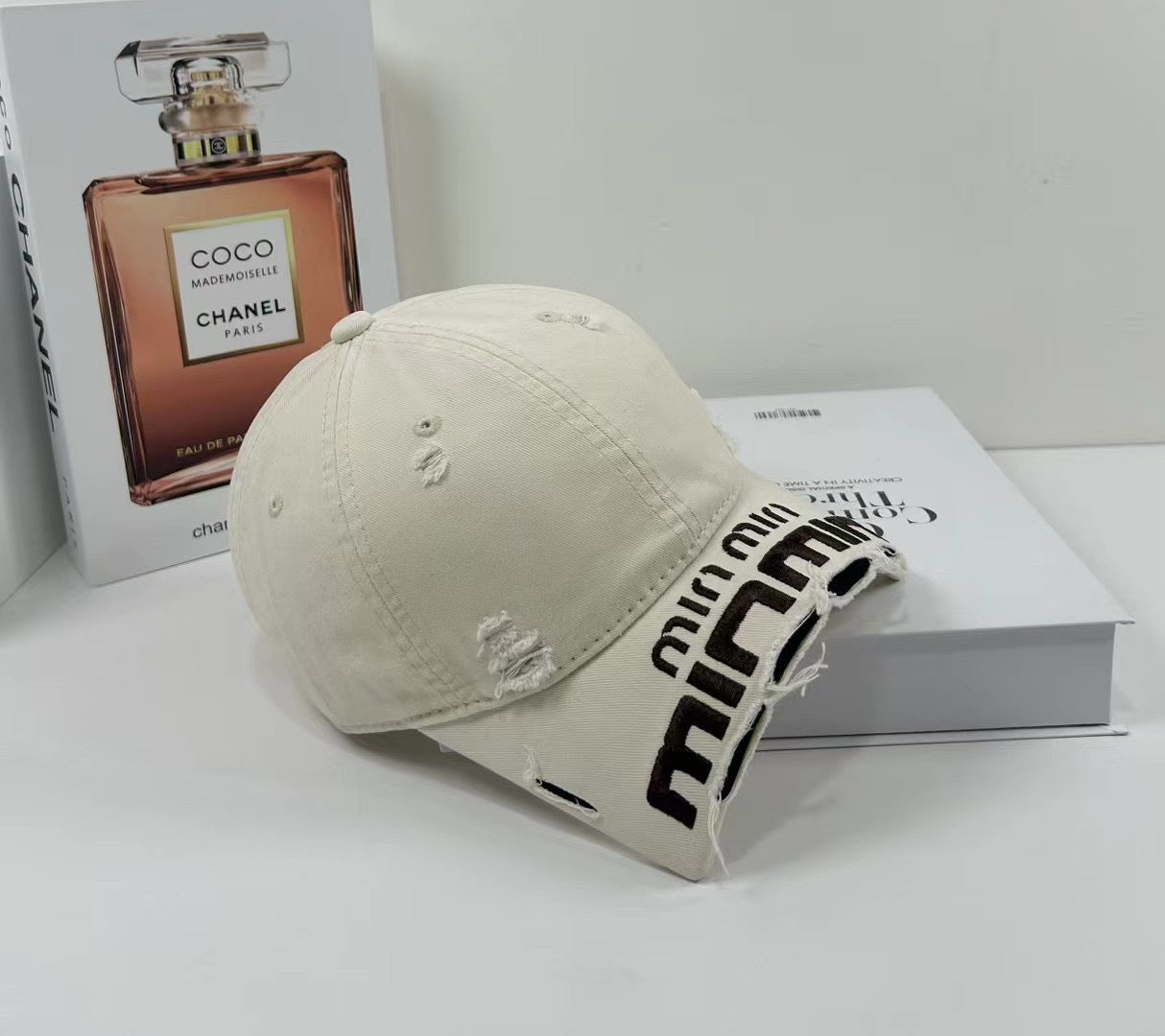 MIUMIU DISTRESSED EMBROIDERED BASEBALL CAP DENIM