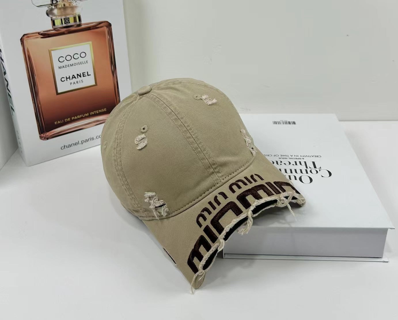 MIUMIU DISTRESSED EMBROIDERED BASEBALL CAP DENIM