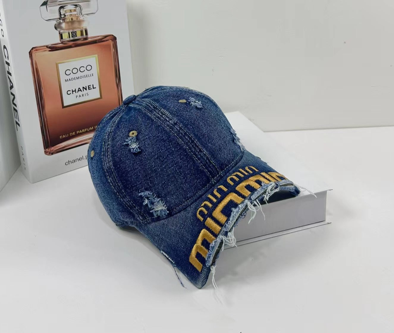MIUMIU DISTRESSED EMBROIDERED BASEBALL CAP DENIM