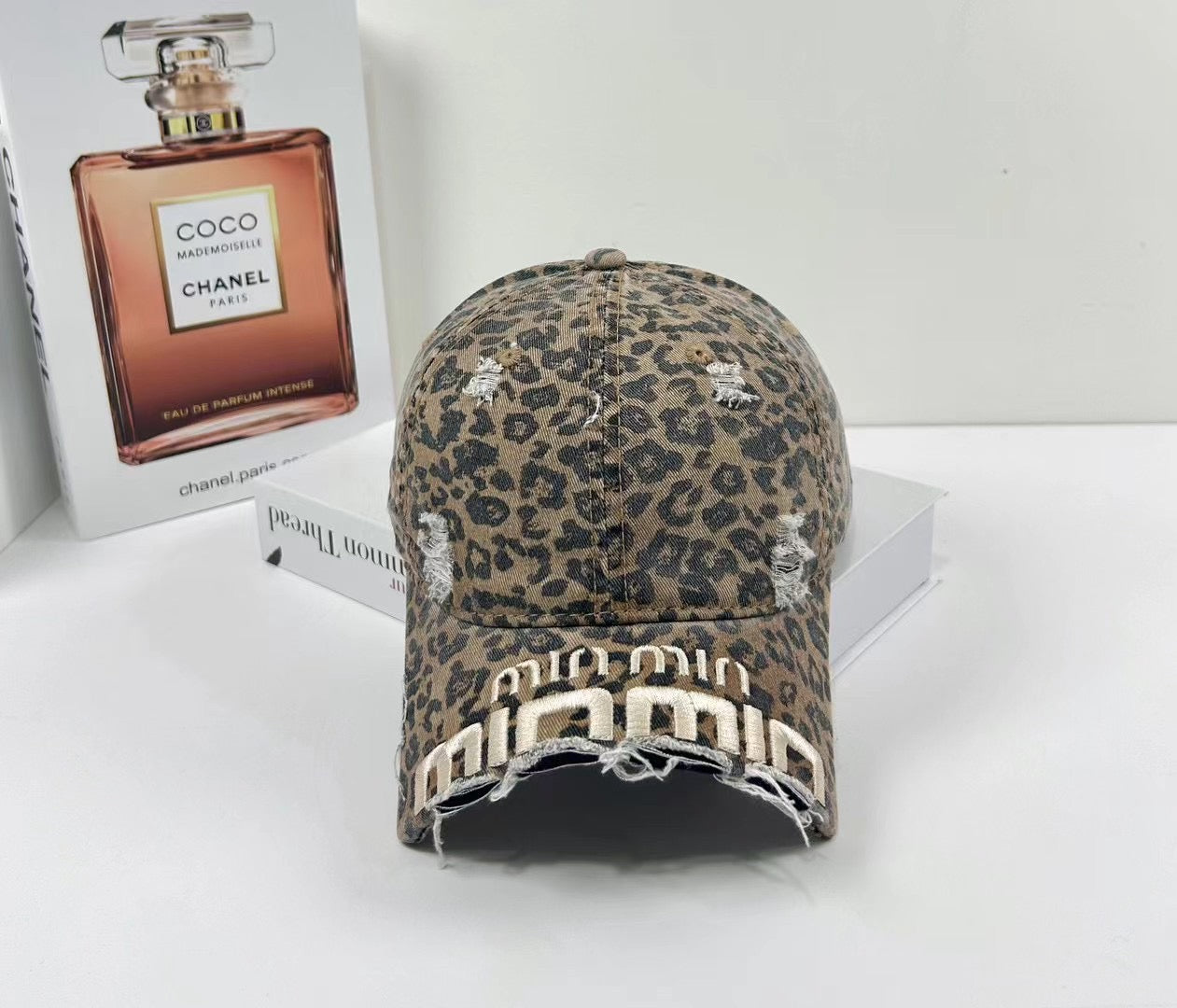 MIUMIU DISTRESSED EMBROIDERED BASEBALL CAP DENIM