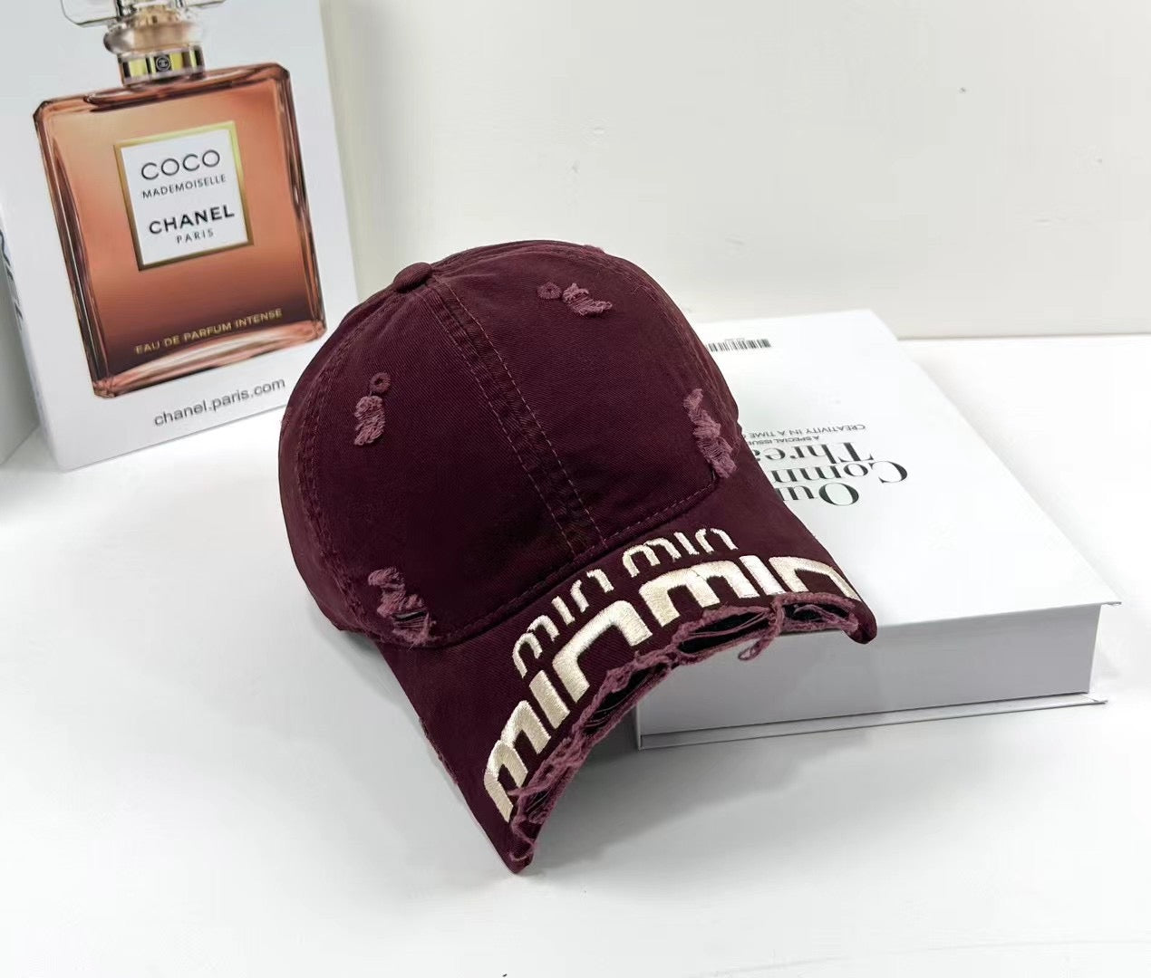 MIUMIU DISTRESSED EMBROIDERED BASEBALL CAP DENIM