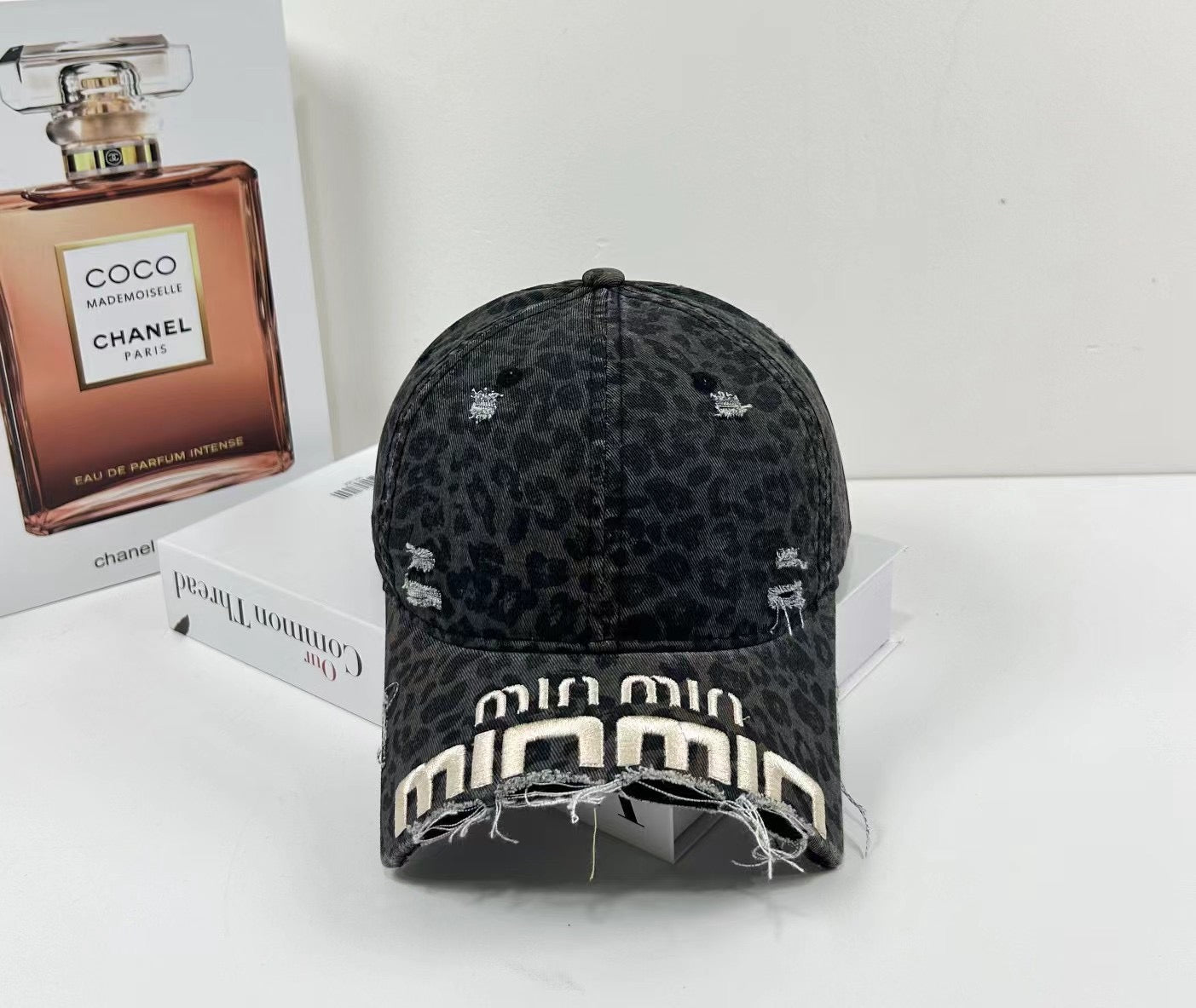 MIUMIU DISTRESSED EMBROIDERED BASEBALL CAP DENIM